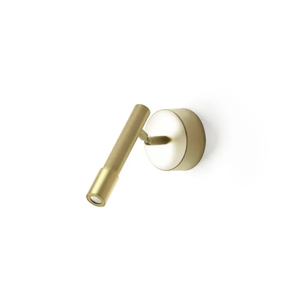 Aplique de pared dorado con foco cilíndrico sobre una base redonda